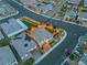 Attractive overhead view of homes with landscaped yards, patios, and well-lit streets at dusk at 10988 Wonder Hills St, Las Vegas, NV 89141