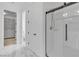 Bathroom with walk in shower and marble floor at 10988 Wonder Hills St, Las Vegas, NV 89141