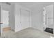 Bedroom with large closet and access to the bathroom and hall at 10988 Wonder Hills St, Las Vegas, NV 89141