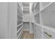 Bright closet with organizers including shelves and drawers with modern pulls at 10988 Wonder Hills St, Las Vegas, NV 89141