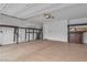 Spacious garage with epoxy floor, storage and electric car charger at 10988 Wonder Hills St, Las Vegas, NV 89141