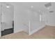 Upstairs hallway features modern floors, and access to rooms for seamless living at 10988 Wonder Hills St, Las Vegas, NV 89141