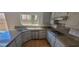 Bright kitchen featuring stainless steel appliances, laminate countertops and light colored cabinets at 1163 Spanish Armada Rd, Las Vegas, NV 89123