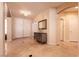 Bright foyer with chandelier, double door entry, and tiled flooring at 1313 Gallery Oaks Dr, Las Vegas, NV 89123