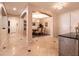 Open hallway with archways leading to dining room and other living spaces at 1313 Gallery Oaks Dr, Las Vegas, NV 89123
