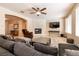 Bright living room showcasing a fireplace, TV, and comfortable seating at 1313 Gallery Oaks Dr, Las Vegas, NV 89123