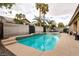 Inviting pool featuring a spa and lush landscaping perfect for relaxing or entertaining outdoors at 1313 Gallery Oaks Dr, Las Vegas, NV 89123