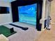 Entertain friends with this golf simulator, perfect for year-round practice and fun at 1486 Neyland Dr, Henderson, NV 89012