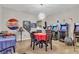 Fun game room featuring classic arcade games and a unique vintage Pepsi sign at 1486 Neyland Dr, Henderson, NV 89012