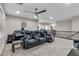 Upstairs living area with reclining chairs and a ceiling fan at 1486 Neyland Dr, Henderson, NV 89012