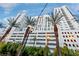Modern high-rise condo building with palm trees, showcasing a vibrant urban lifestyle at 150 Las Vegas Blvd # 1711, Las Vegas, NV 89101