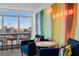 Lounge area with comfortable seating, city views and colorful design at 150 Las Vegas Blvd # 1711, Las Vegas, NV 89101