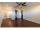 Bedroom features wood floors, ceiling fan, recessed lights and closet with bi-fold doors at 1513 Kirkland Ave, Las Vegas, NV 89102