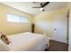 Bedroom features ceiling fan, recessed lights, wood floors and window providing natural light at 1513 Kirkland Ave, Las Vegas, NV 89102