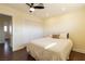 Bedroom features closet, ceiling fan, recessed lights, wood floors and window providing natural light at 1513 Kirkland Ave, Las Vegas, NV 89102