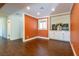Spacious dining room with hardwood floors, recessed lighting, a large window, and built-in cabinets at 1513 Kirkland Ave, Las Vegas, NV 89102