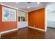 Dining room with hardwood floors, recessed lighting, large window, and built-in cabinets at 1513 Kirkland Ave, Las Vegas, NV 89102