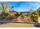 Charming single-story home boasting well-maintained landscaping, desert plants, and a cozy front yard at 1513 Kirkland Ave, Las Vegas, NV 89102