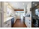 Well-lit modern kitchen with stainless steel appliances and a view into the backyard at 1513 Kirkland Ave, Las Vegas, NV 89102