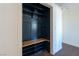 Mud room with custom storage, coat hooks and bench seating at 1513 Kirkland Ave, Las Vegas, NV 89102