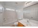 Well-lit bathroom features a shower-tub combination and single sink vanity at 1552 Wild Willey Way, Henderson, NV 89002