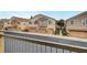 Townhome exteriors feature private garages and well-maintained landscaping at 1552 Wild Willey Way, Henderson, NV 89002
