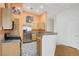 Kitchen with stainless steel appliances and tile floors at 1552 Wild Willey Way, Henderson, NV 89002