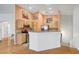 View of kitchen with stainless steel appliances and hardwood floors at 1552 Wild Willey Way, Henderson, NV 89002