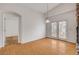 Bright living room with hardwood floors and doorway at 1552 Wild Willey Way, Henderson, NV 89002