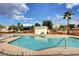 Community pool area featuring a clean pool, desert landscaping, and clear blue skies, offering a refreshing outdoor space at 1552 Wild Willey Way, Henderson, NV 89002