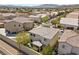 An aerial view of a residential neighborhood featuring well maintained homes at 168 Springhouse St, Las Vegas, NV 89148