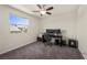 Cozy bedroom with natural light, ceiling fan, and neutral decor, perfect for a home office setup at 168 Springhouse St, Las Vegas, NV 89148