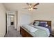 Comfortable bedroom with soft carpet, neutral walls, and ample closet space at 168 Springhouse St, Las Vegas, NV 89148