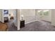 Second floor hallway with natural light and a view into a bedroom at 168 Springhouse St, Las Vegas, NV 89148