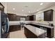Beautiful kitchen with stainless steel appliances, granite counters, and a center island at 168 Springhouse St, Las Vegas, NV 89148