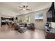 Spacious living area with an open floor plan, lots of natural light, and modern finishes at 168 Springhouse St, Las Vegas, NV 89148