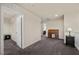 Versatile loft area with carpet flooring, a desk, and plenty of space, perfect for a home office or study at 168 Springhouse St, Las Vegas, NV 89148