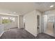 Bright and airy loft space with neutral carpeting, windows, and a staircase, offering flexible living options at 168 Springhouse St, Las Vegas, NV 89148