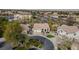 Aerial view of a single Gathering home on a cul-de-sac with mature trees at 1720 Sand Storm Ct, Henderson, NV 89074