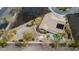 Aerial view of a single Gathering home showing the pool and patio, landscaping, and solar panels at 1720 Sand Storm Ct, Henderson, NV 89074