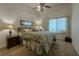 Serene bedroom with a neutral color palette, plush carpeting, and ample natural light at 1720 Sand Storm Ct, Henderson, NV 89074