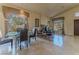 Bright dining room with elegant chandelier and a view of the outdoors at 1720 Sand Storm Ct, Henderson, NV 89074