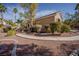 Landscaped backyard with mature trees and plants at 1720 Sand Storm Ct, Henderson, NV 89074