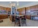 Modern kitchen with custom cabinets, granite countertops, and stainless steel appliances at 1720 Sand Storm Ct, Henderson, NV 89074