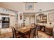 Inviting dining room adjacent to the kitchen, featuring a wooden table and stylish decor at 1721 Derbyshire Dr, Las Vegas, NV 89117