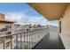 Balcony view overlooking the city, complete with sleek railings and ample outdoor space at 205 E Harmon Ave # 1010, Las Vegas, NV 89169