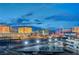 Breathtaking city view showcasing iconic hotels and the High Roller Observation Wheel at dusk at 205 E Harmon Ave # 1010, Las Vegas, NV 89169