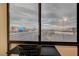 A stunning city view from the large window in the apartment is the room's focal point at 205 E Harmon Ave # 1010, Las Vegas, NV 89169