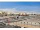 Expansive building with modern architecture, adjacent to the Las Vegas Strip and its iconic skyline at 205 E Harmon Ave # 1010, Las Vegas, NV 89169