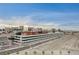 Expansive building with modern architecture, adjacent to the Las Vegas Strip and its iconic skyline at 205 E Harmon Ave # 1010, Las Vegas, NV 89169